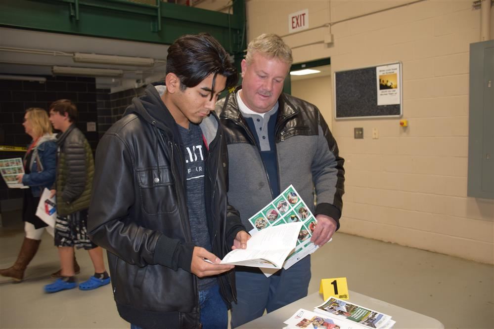 A student with his father at Open House
